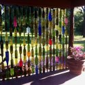 20+ Ideas of How to Enhance Your Garden with Glass Bottles