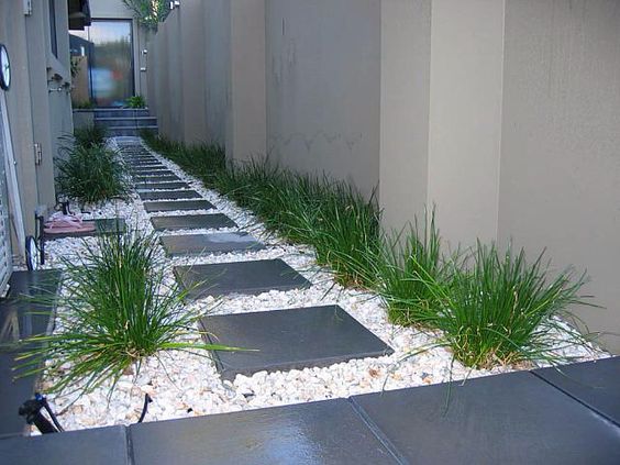 landscaping pebbles stones concrete pathways path between