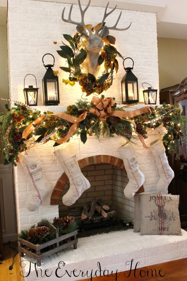 christmas-mantel-with-faux-deer-head-lanterns-and